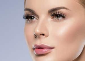 Woman has cute proportional nose that complements her face shape and structure.